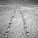 Tracks left on Mars by the Opportunity rover, photographed on November 12, 2013.